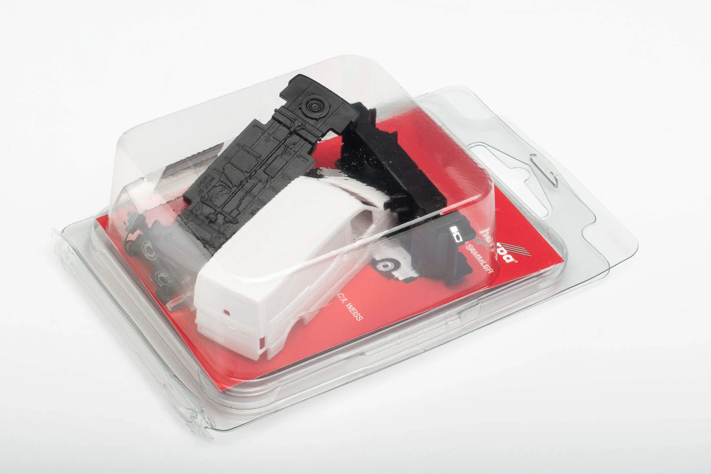 herpa - Herpa Minikit: MAN TGE box z płaskim dachem, biały