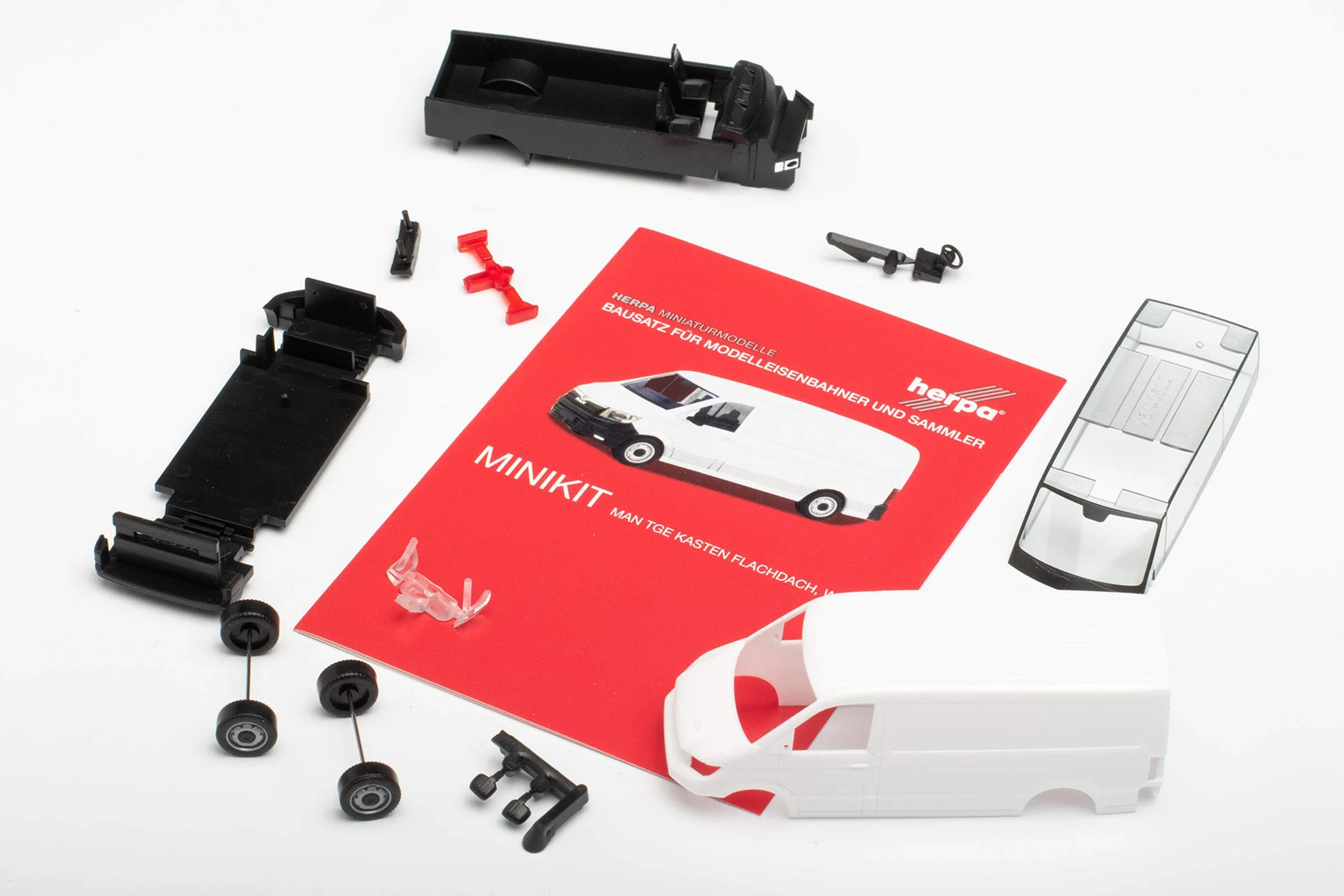 herpa - Herpa Minikit: MAN TGE box z płaskim dachem, biały